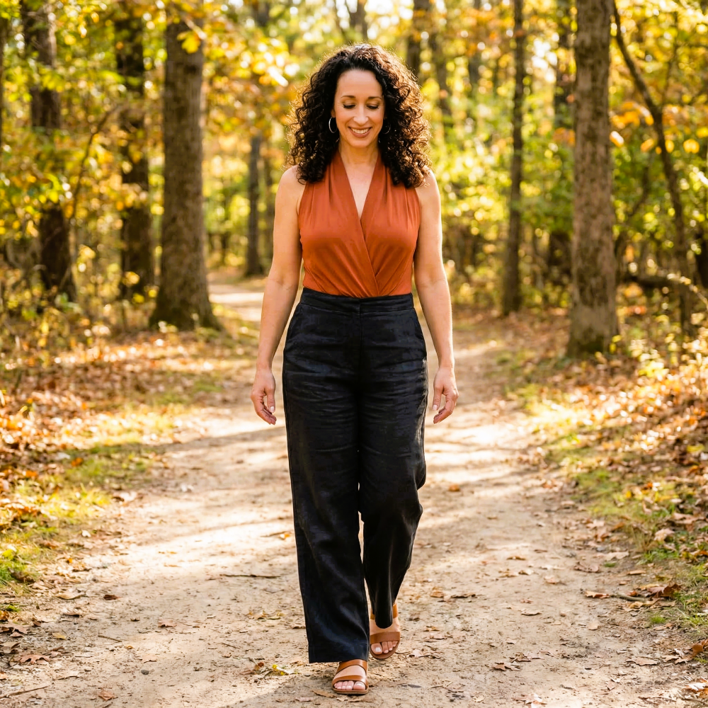 Cassandra Quick, EMDR Certified therapist, walking on a wooded trail
